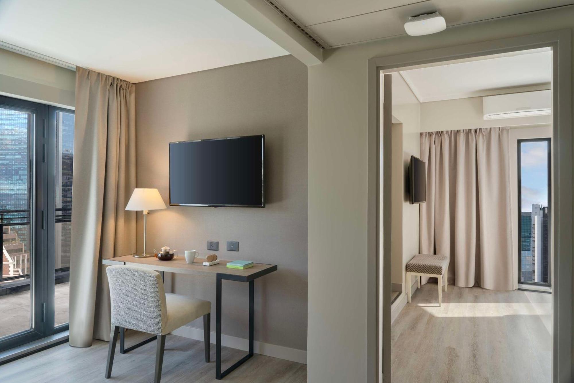 Suite New Style con terraza y cama supletoria (2 adultos + 1 niño)
